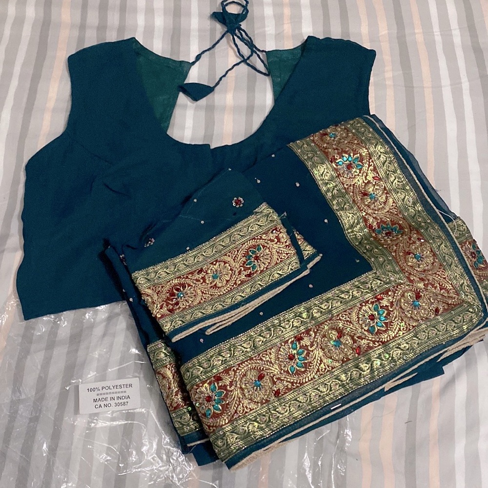 Saree with stitched blouse piece and sleeve attachments